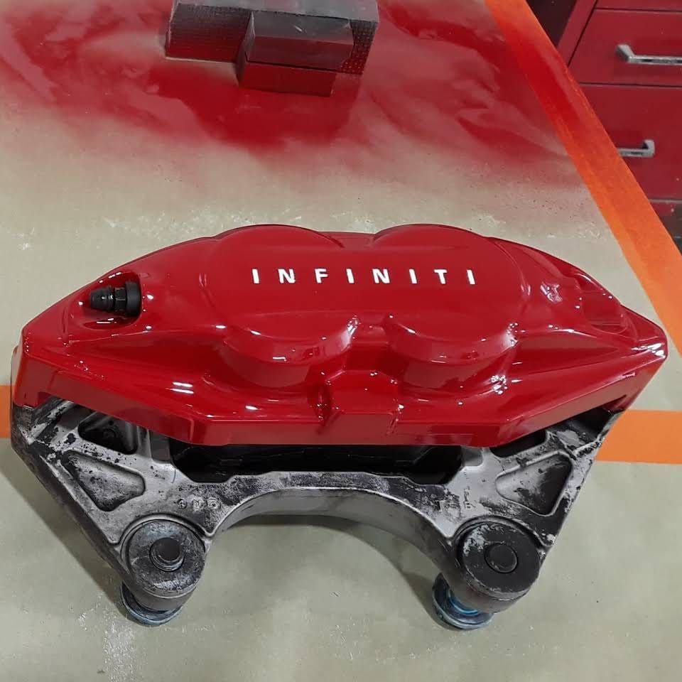 The same Infiniti caliper painted gloss red